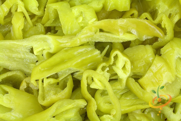 Hot pepperoncini seeds from SeedsNow, showing small green pepper seeds ideal for growing hot peppers.